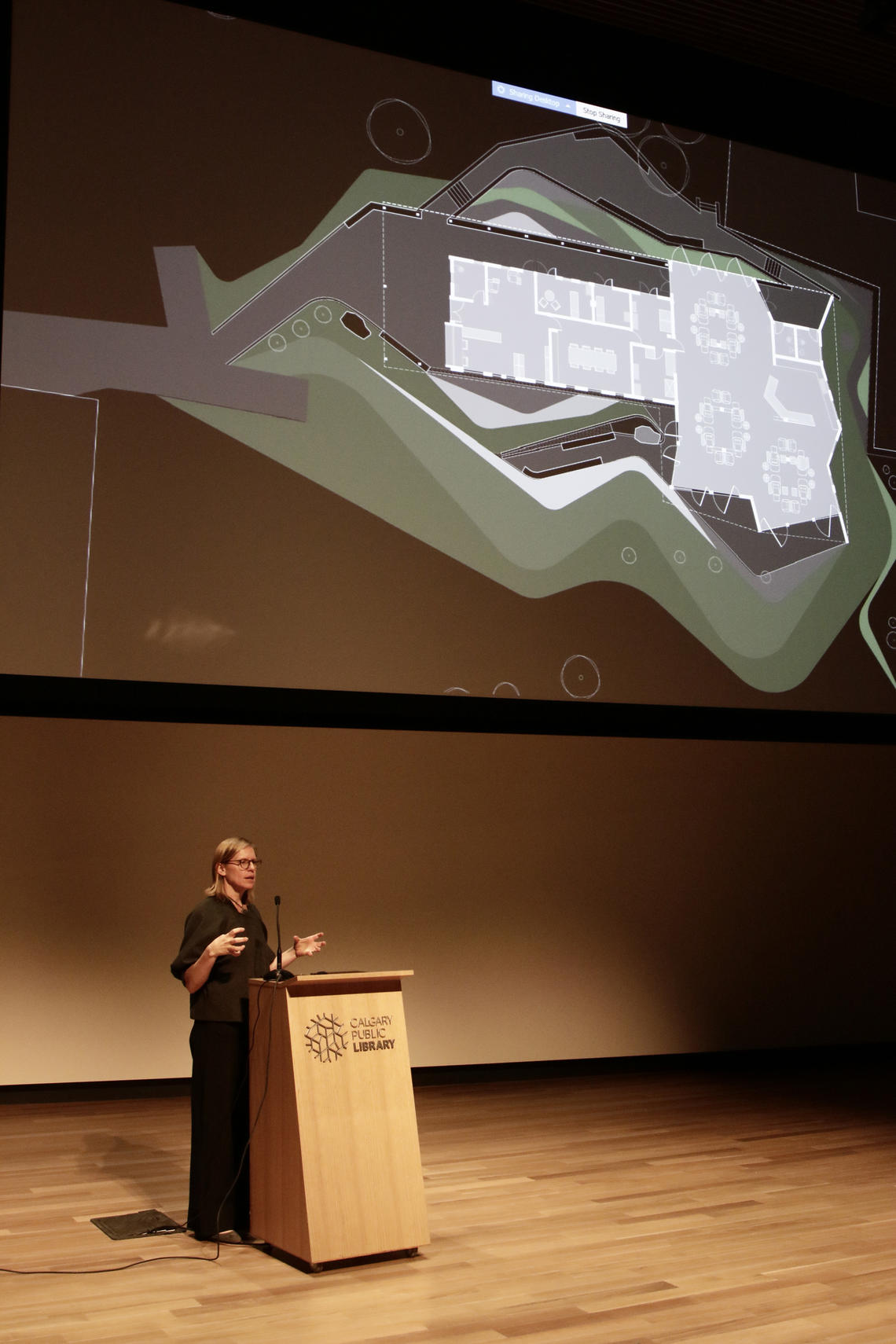 Sierra Bainbridge, speaker at the University of Calgary's Design Matters Lecture Series, addresses an audience at the New Central Library.
