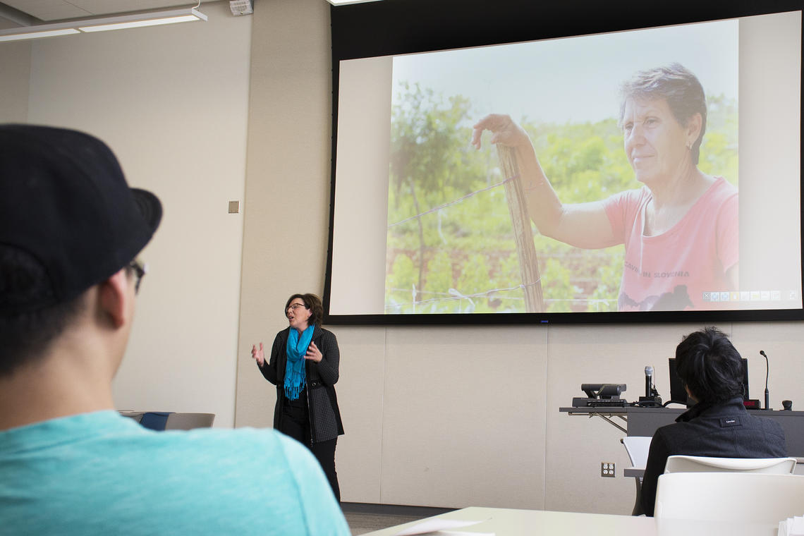 Inside the global challenges classroom, guest speaker Brenda Schoepp presents. Schoepp is a Nuffield Scholar and has a diverse background in farming and international development.