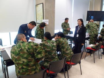 Monica Franco in a military group meeting in Colombia 