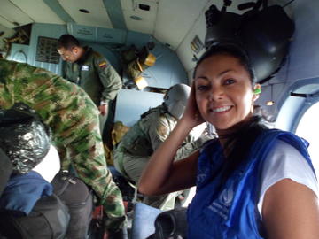 Monica Franco in U.N. uniform inside a helicopter
