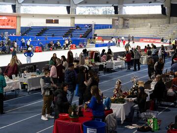 Holiday market at the Oval with vendors and visitors