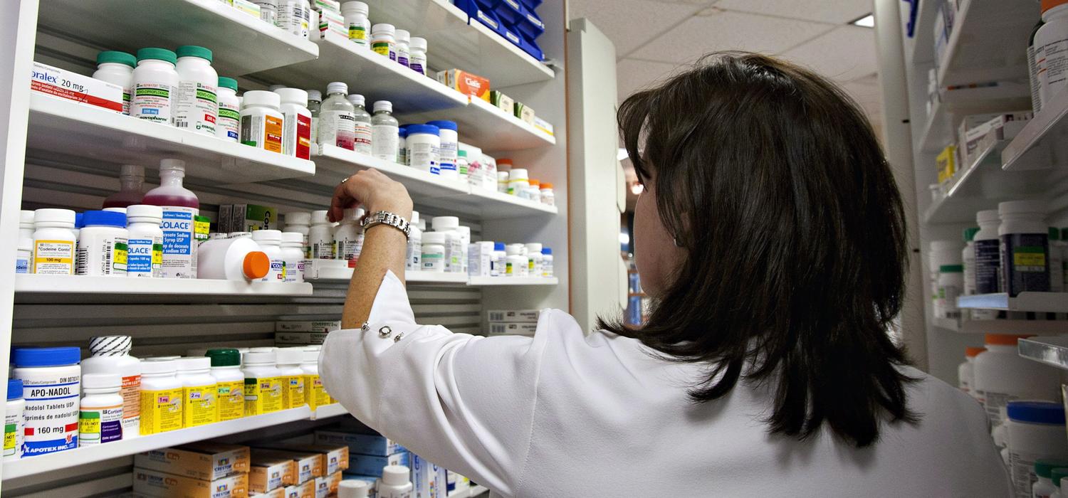 A lab technician prepares a prescription at a pharmacy in Quebec City on March 8, 2020