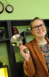 Madelyn Worth rings the Graduate Programs in Education bell