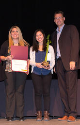 UCalgary’s Standardized Waste Bin Project won the 2019 Staff Sustainability Award: Group Leadership. Ana Pazmino, centre left, and Natasha Yee, centre right, accepted the award on the group’s behalf from Florentine Strzelczyk and Bart Becker. Photos by Riley Brandt, University of Calgary