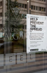 Help Prevent the Spread sign on door of EEEL building
