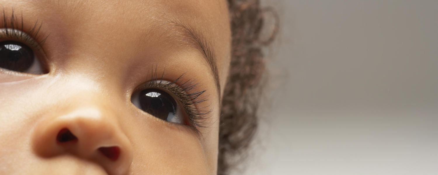 Young child with a sparkle in his eyes