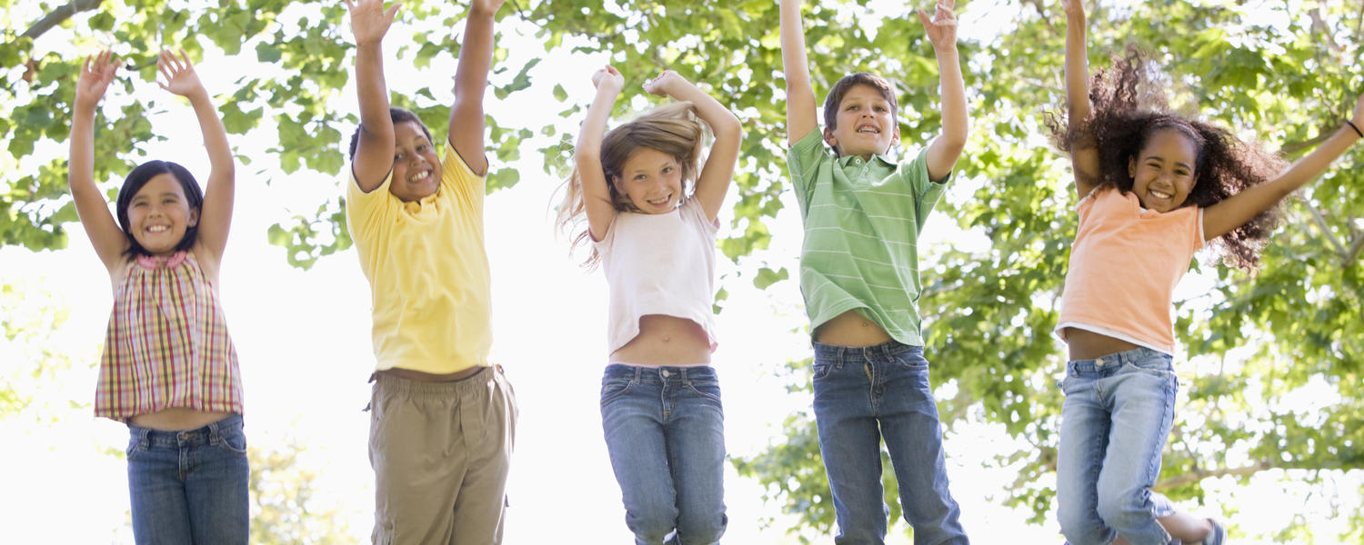 kids jumping outside