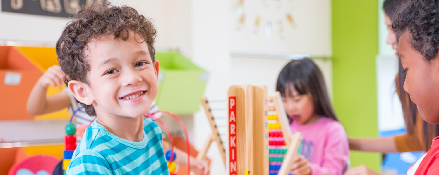 boy playing with blocks